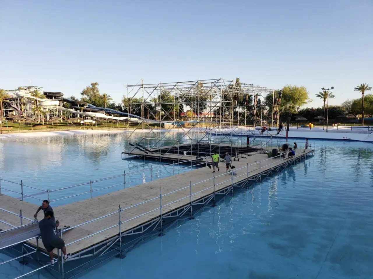 Construction on water at an amusement park.