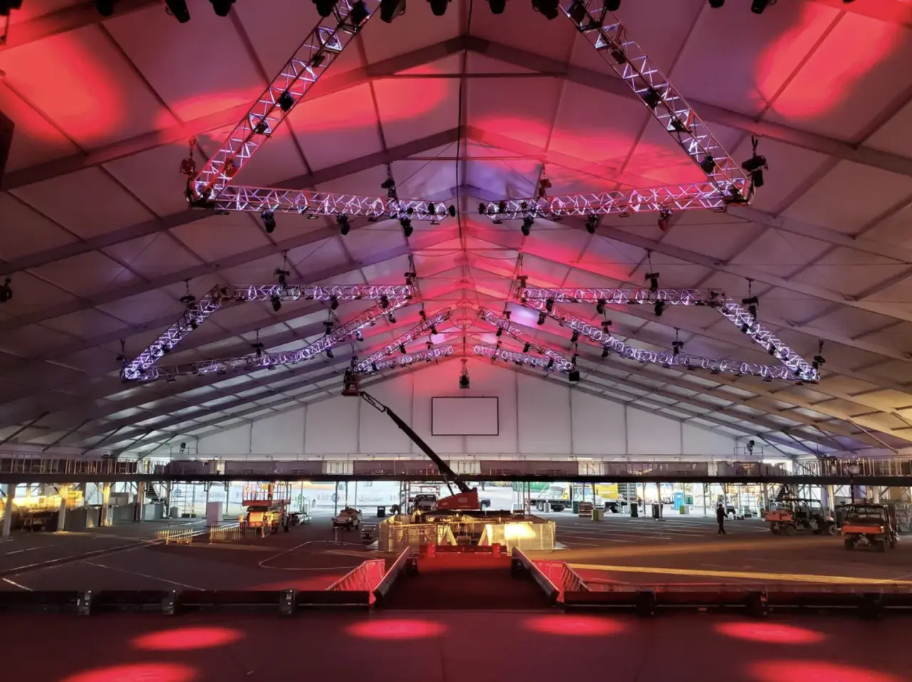 Stage setup with red and purple lighting.